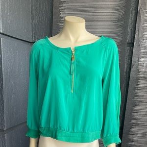A soft lightweight teal blouse in large. Brand is Jennifer Lopez.